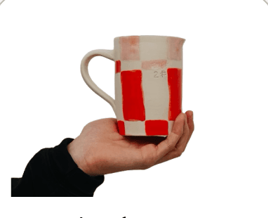 A red and cream checkered mug